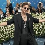 Shah Rukh Khan stuns with a regal debut at Met Gala 2025, posing and owning the spotlight.